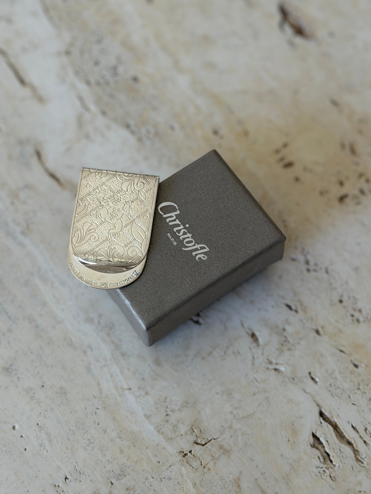 Christofle Paris silver-plated Jardin money clip displayed alongside original box from Collectors Gene