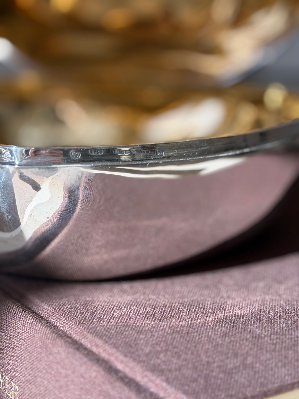 Close detail of the box rim stamped with a maker&