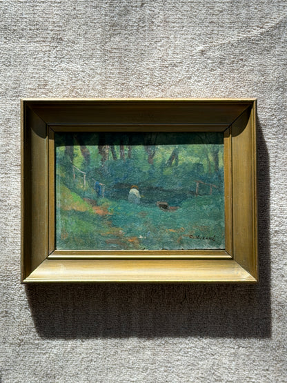 Angled close view of the woodland pond painting in sunlight, showing textured brushwork, a figure in blue by a rustic rail, and a plank footbridge at right
