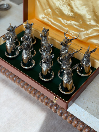Overhead view from the opposite side of the box, showing the gold satin lid lining and the brown beaded trim of the case