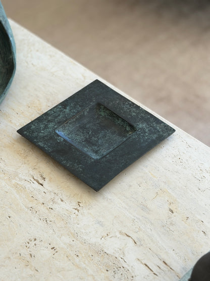 Perspective view showing natural oxidation and charcoal verdigris patina of square bronze desk tray