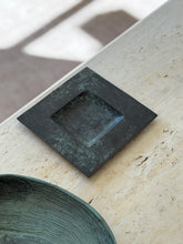 High angle view of square dark verdigris bronze catchall dish with recessed center by Collectors Gene
