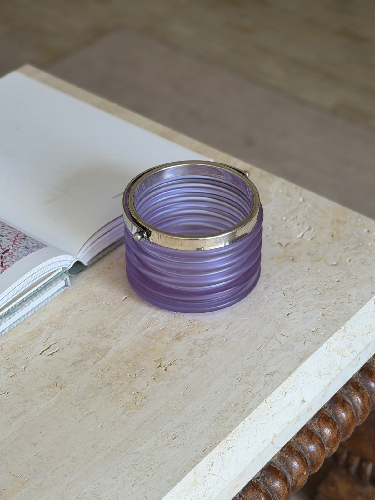Overhead view looking down into the bucket, showing the ribbed interior and the swing handle resting against the rim
