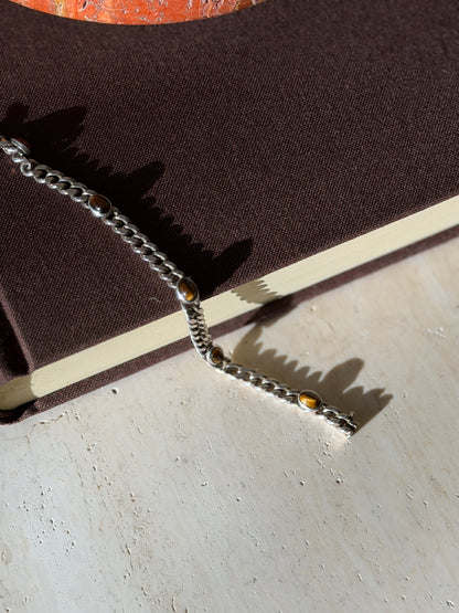 Sterling curb bracelet with oval tiger&